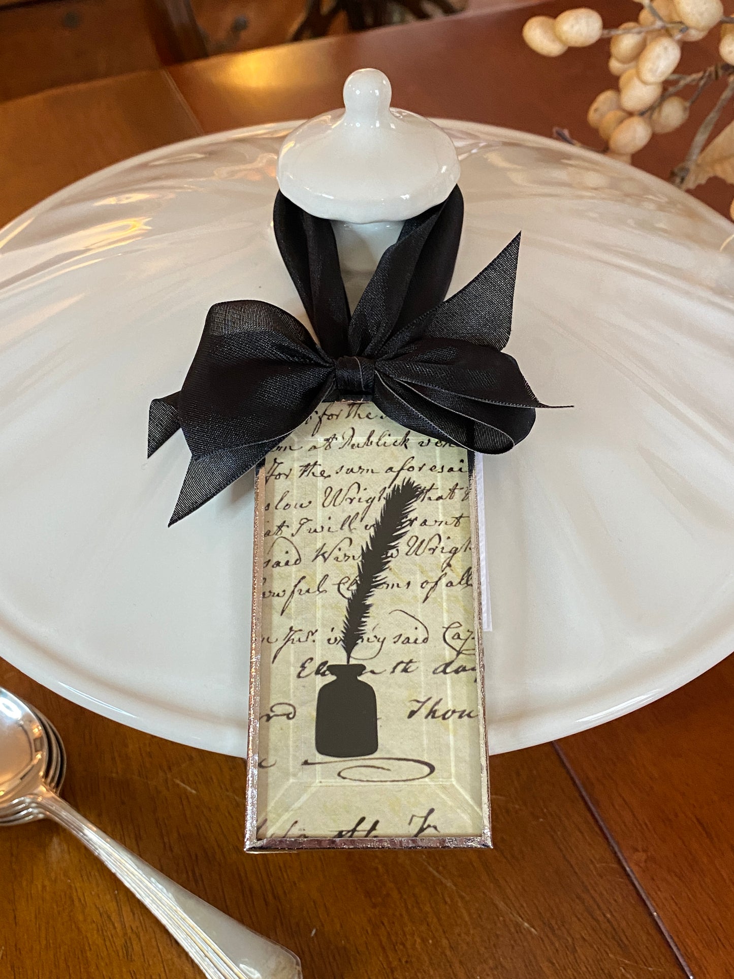 Inkwell and feather pen ornament